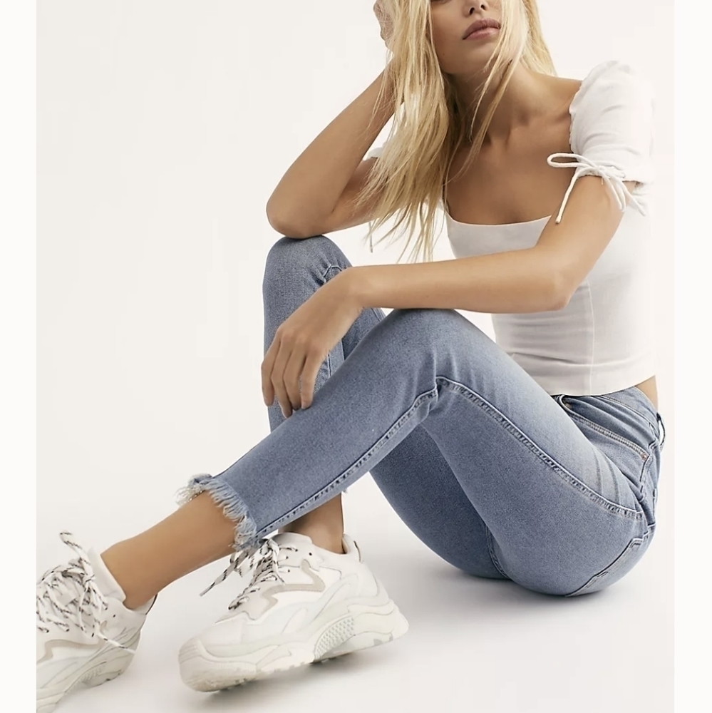 WE the free Light Wash High Waist Raw Hem Jeggings 24